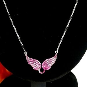 Sterling silver & dark pink stones create a lovely Angel Wings necklace!